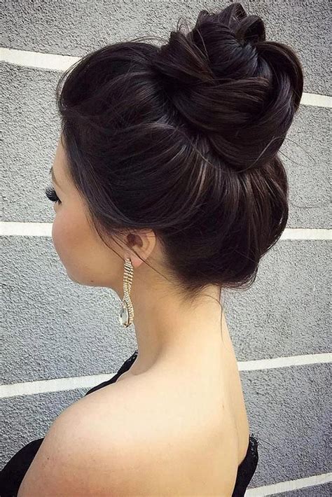 Wedding hairstyle for long hair side bun bridal hairstyle. 30 Lovely Wedding Bun Hairstyles | Wedding Forward in 2020 ...