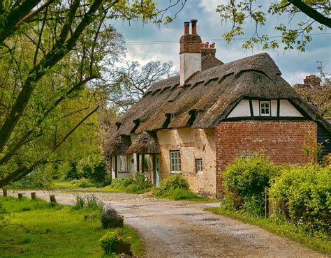 These 16th Century Thatched Cottages In Charlton Andover Were Once The