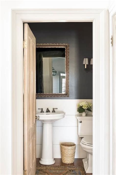 Powder Room With Black Painted Wall And White Shiplap Trim