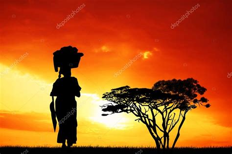 African Woman Silhouette At Sunset — Stock Photo © Adrenalina 117285710