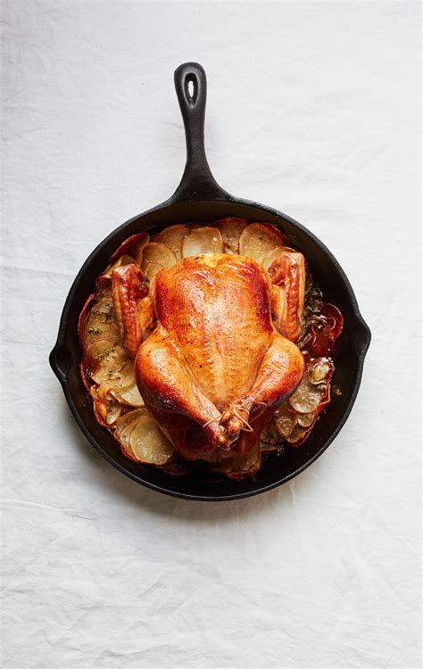 Harvest chicken skillet with sweet potatoes, apples, brussels sprouts and bacon. Cast-Iron Roast Chicken with Crispy Potatoes | Bon Appétit