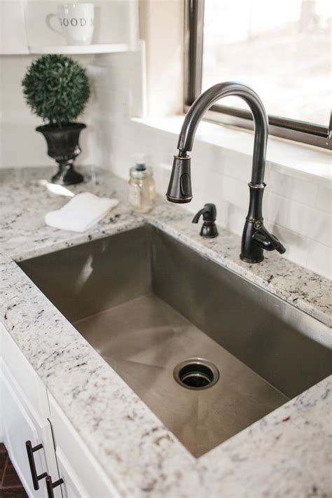 If the sink is an undermount type, unfasten the screws holding it to the countertop. The Best Sink Material for a Kitchen — Opal Design Group