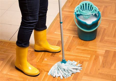 Housekeeper Mopping Parquet Floor Stock Photo Image Of Legs