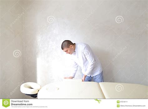 Professional Male Massage Therapist Preparing To Receive Patient Stock Image Image Of Interior