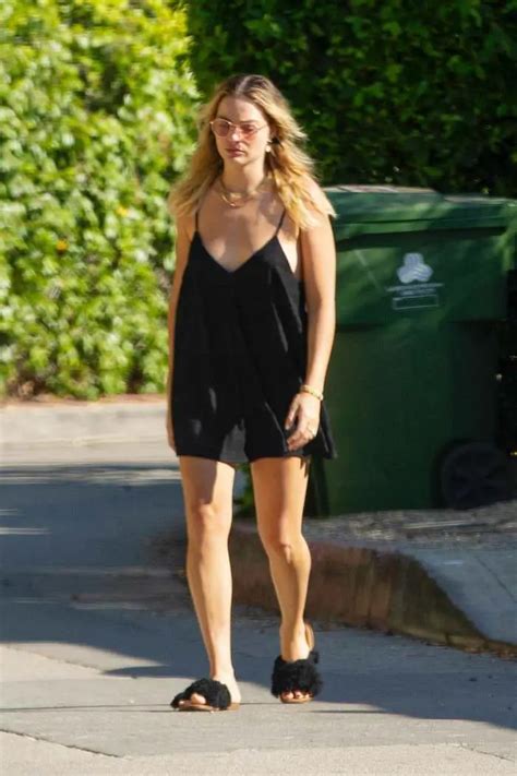 Margot Robbie Steps Out In A Stunning Black Mini Dress In La