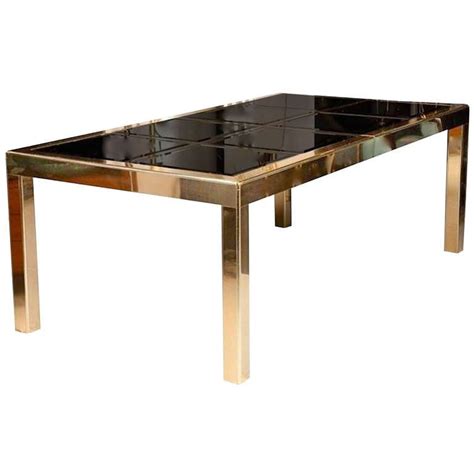 30'' h x 17'' w x 17'' d. Mastercraft Bronze Mirror and Brass Dining Table at 1stdibs