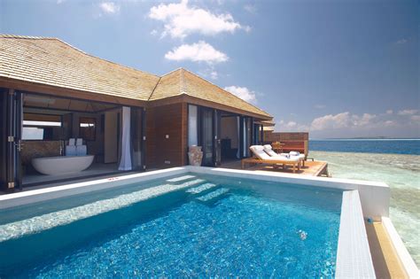 Find us at hibiscus resort & spa 22 owen st town centre of port douglas 4099 5183. Lily Beach Resort & Spa in Maldives | Architecture & Design