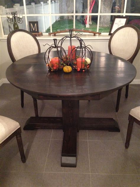 In smaller homes, use a small modern dining table as a kitchen table instead. Round Kitchen Table - Shanty 2 Chic