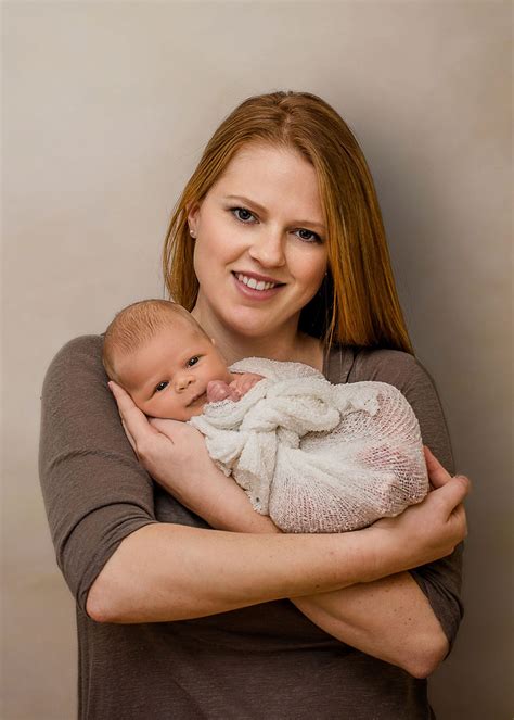 Red Haired Mom Holding Baby Girl Wrapped In Her Arms Baby Girl Wraps