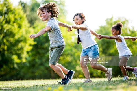 Children Holding Hands And Running High Res Stock Photo Getty Images