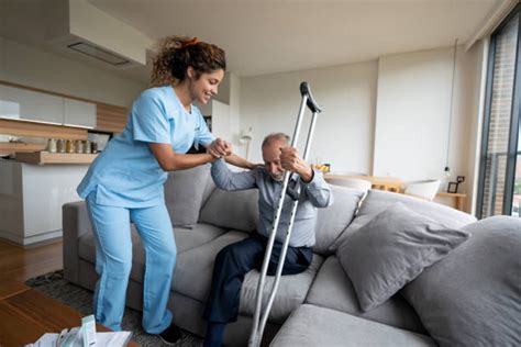 Male Amputee Using Crutches Stock Photos Pictures And Royalty Free