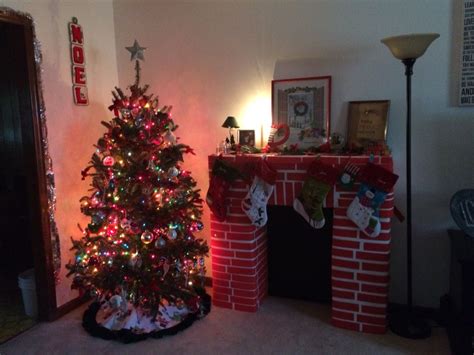 Choose a design or create your own. DIY cardboard fireplace made out of boxes and white + red ...