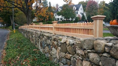 Connecticut Picket Fence On Stonewall Traditional House Exterior