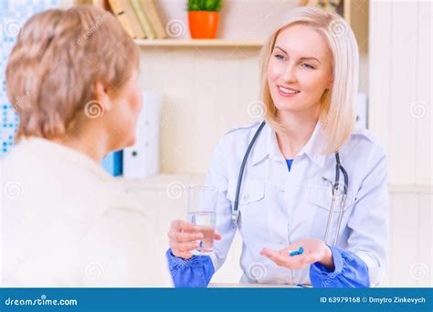 Pleasant Nurse Speaking With Her Patient Stock Photo Image Of