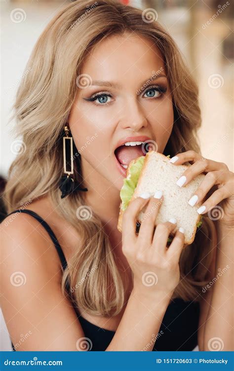 Attractive Woman Eating Delicious Sandwich In Cafe Stock Image Image Of Breakfast Happiness