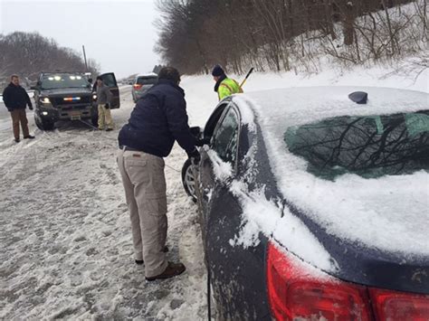 New York Governor Andrew Cuomo Helps Driver Stranded On Snowy Road