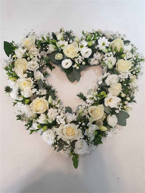 Pink roses sheaf from $129. Funeral heart - White - The Flower Hall