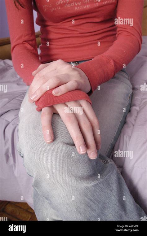 Hands Folded On Lap Hi Res Stock Photography And Images Alamy