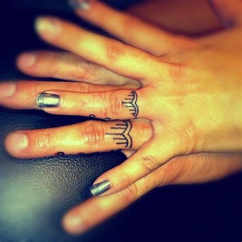 42 Wedding Ring Tattoos That Will Only Appeal To The Most Amazing Of Couples Tattooblend