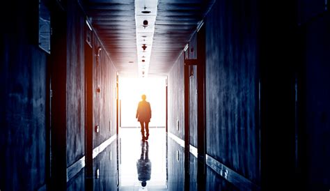 Woman Walking Into The Light Stock Photo Download Image Now Istock