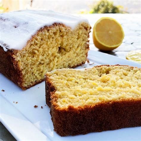 Two Slices Of Lemon Bread On A White Plate