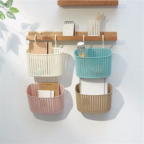 Next, cut some ribbon and thread it through your baskets it hangs extra rolls that would otherwise claim cabinet or basket space against your bathroom wall. 1PCS Bathroom Rattan Hanging Basket Multifunction Kitchen ...