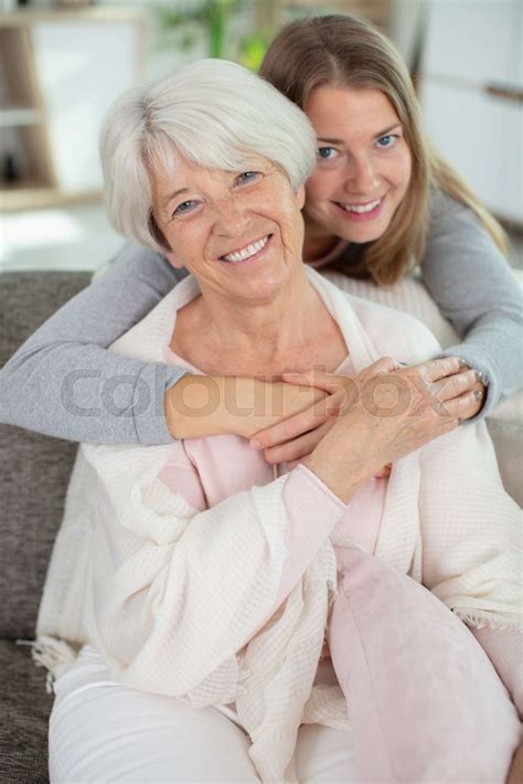 Charming Blonde Lady Hugging Her Mother Stock Image Colourbox