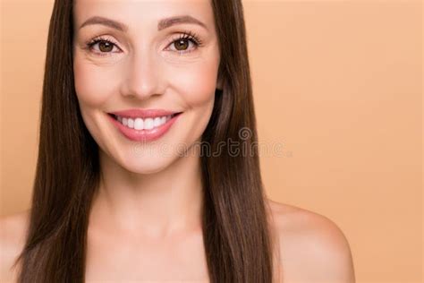 Photo Of Pretty Adorable Mature Woman Naked Shoulders Empty Space Smiling Isolated Beige Color