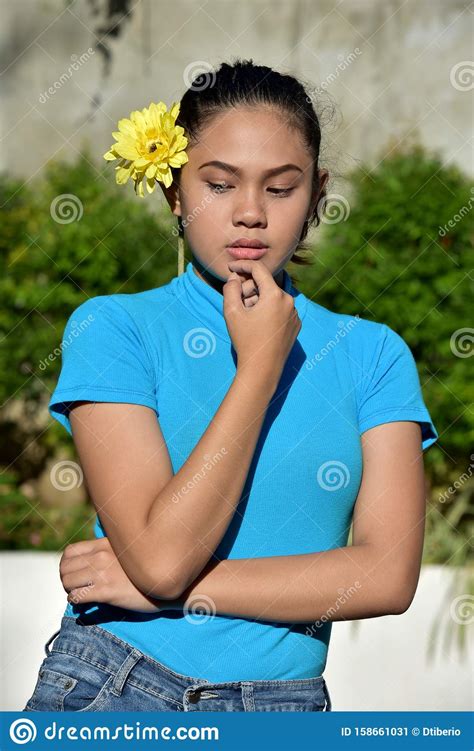 unhappy youthful filipina adult female with flowers stock image image of youthful flower