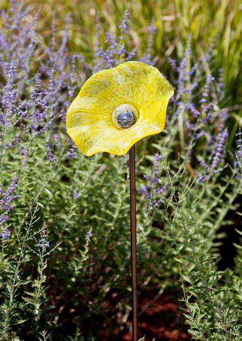 This solar powered section of lights provides you with lights that charge all day and stay lit all night. Solar Yard Art: Moonflower Stake | Gardeners.com | Solar ...