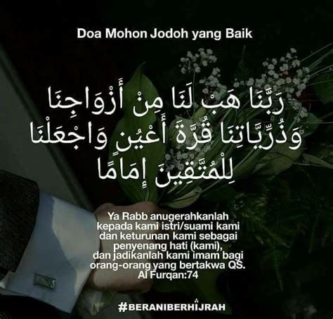 a man holding flowers in his hand with an arabic quote above it that