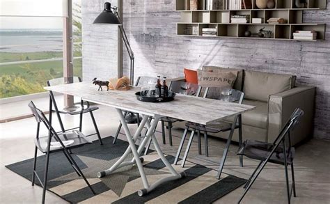 Planet coffee table that can be transformed into a dining table. 10 Great Transformable Living and Dining Room Tables by Ozzio