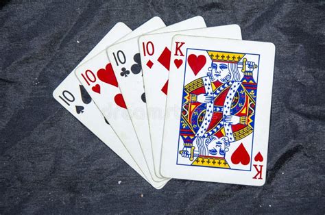 Five Playing Cards Four Of A Kind Tens And A King Stock Image Image