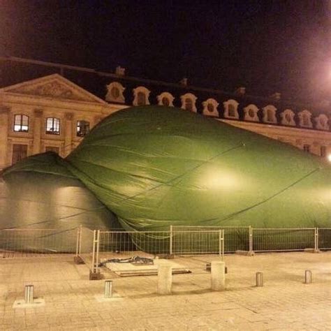there is an inflatable christmas tree in paris that looks like a giant butt plug complex