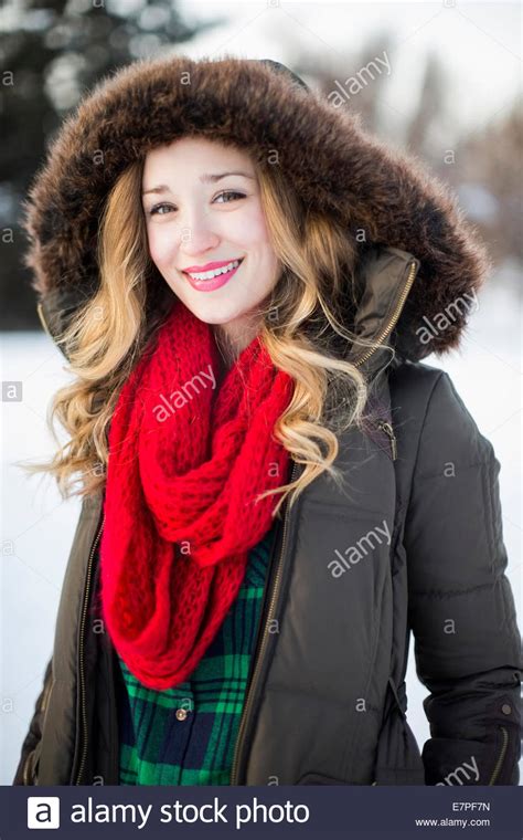 Portrait Of Woman Wearing Red Scarf Smiling Outdoors Stock Photo Alamy