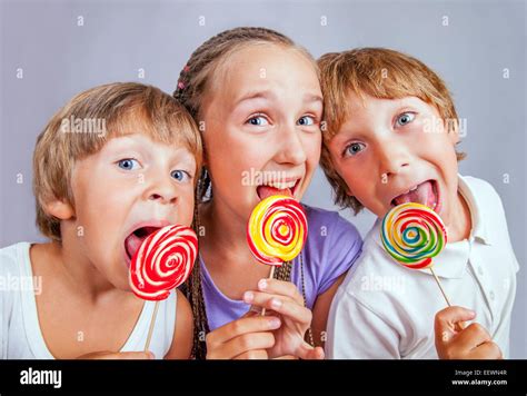 Group Children Eating Candy Stock Photo Alamy