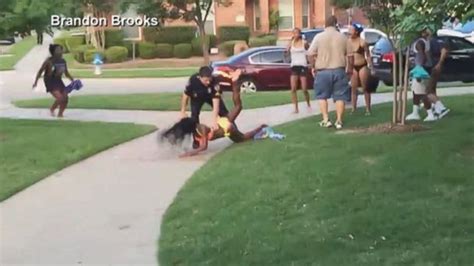 suburban dallas police officer on leave after video shows him pushing teen to ground pulling