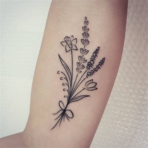 Wildflower Bouquet Tattoo Was Done At Mu Body Arts Bouquet Tattoo