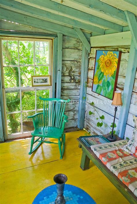 The corresponding color palette is both quiet and powerful, depending on which hues are in focus. Porch of house with painted wood floor, bright colors ...