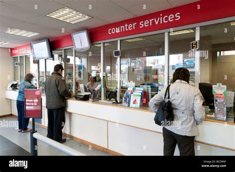Post Office Counter London England Uk Stock Photo Alamy