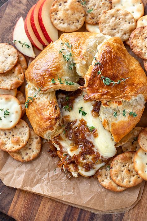 Baked brie with pumpkin maple sauce. Baked Brie with Caramelized Onions | The Cozy Apron