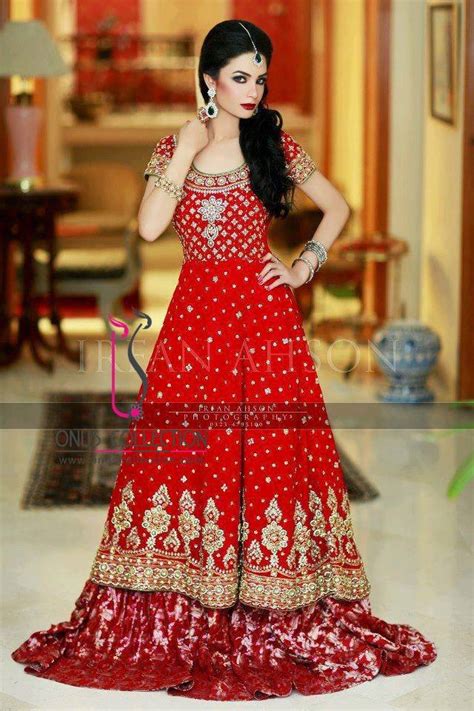 Pakistani model walked in karachi bridal couture week 2014 wearing heavy bridal dress. Latest Pakistani & Indian Wedding Dresses 2016-17 Collection