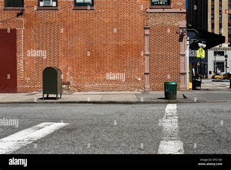 Empty Urban Street Scene With Brick Wall In New York City Stock Photo