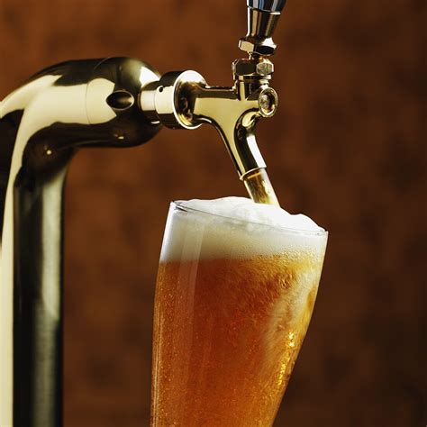 Pouring Beer Into A Glass From A Tap License Images 644258 Stockfood