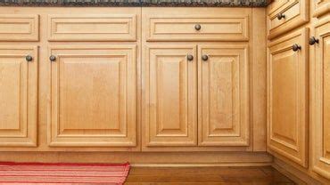 If you already have wood cabinets and doors, a simple paint job will achieve a similar effect. What Is the Best Way to Clean Wood Cabinets? | Cleaning wood, Wood cabinets, Laminate kitchen