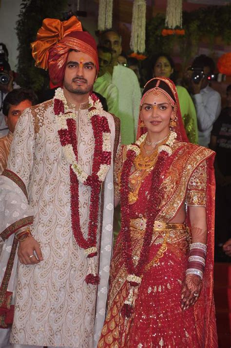 Ahana deol attended isha ambani and anand piramal's wedding reception wearing a navy blue floral embroidered saree paired with pink embroidered blouse by dolly j. Esha Deol's wedding album - | Photo1 | India Today