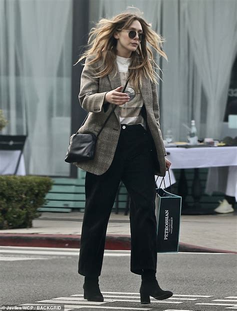 Elizabeth Olsen Swaps Red Locks For A Dirty Blonde During Break From