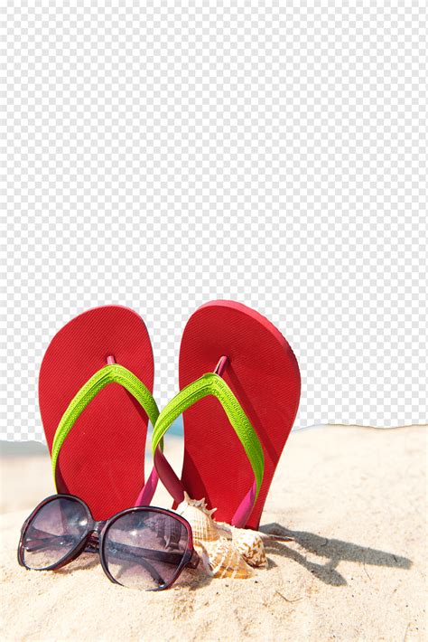 Flip Flops Beside Sunglasses On Sand In Close Up Graphy Slipper Summer