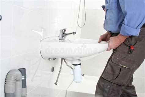 Installing The Drain Pipes Of A Kitchen Sink Stock Photo Image Of