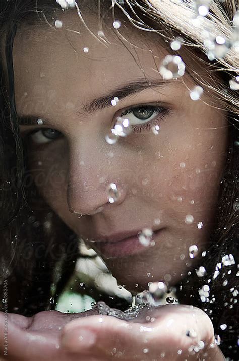 Portrait Of Beautiful Brunette Girl Drinking Spring Water By Marija Anicic Stocksy United